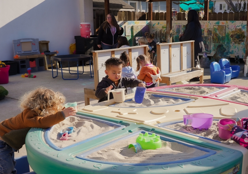 Children exploring nature at daycare in Alameda